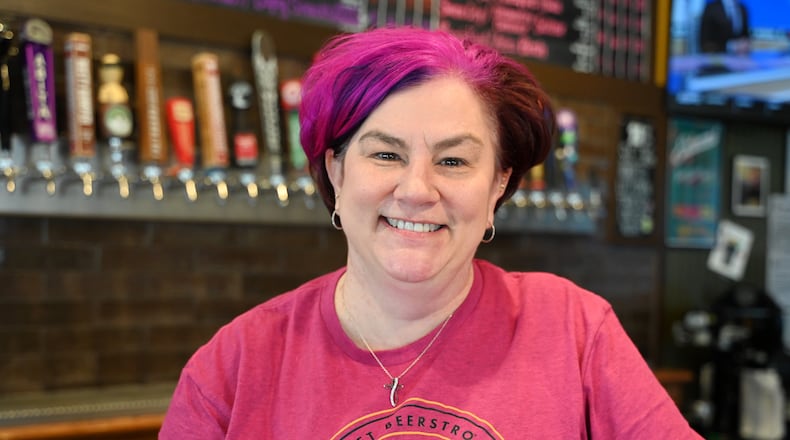 Ann Marie Cilley, owner of The Casual Pint in Hamilton, had many patrons and community members rally behind her when a flood happened in her Riverfront Plaza bar and restaurant, a couple of weeks before one of the biggest times of the year for her industry. Pictured is Cilley at The Casual Pint in Hamilton on Wednesday, March 12, 2025. MICHAEL D. PITMAN/STAFF