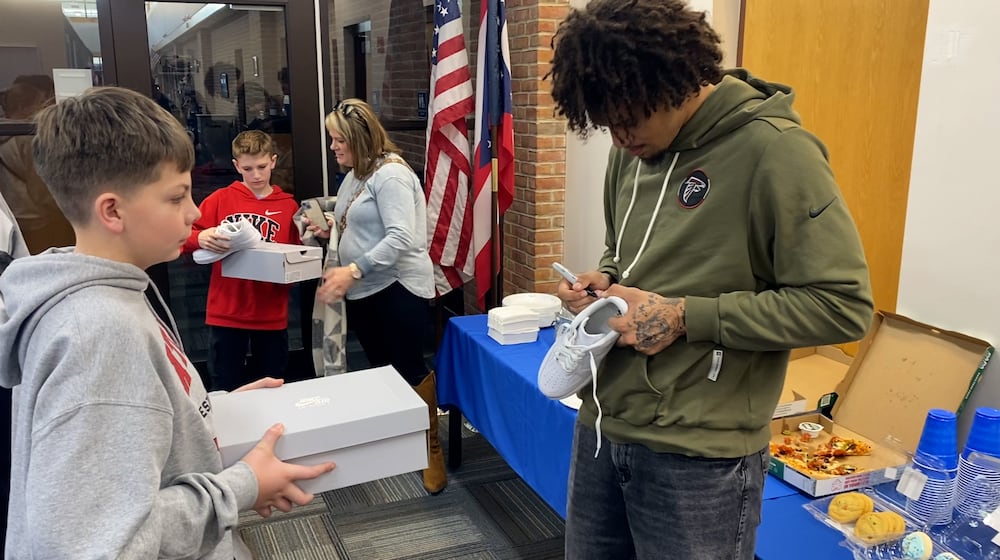 Atlanta Falcons defensive back and Hamilton High School graduate Malik Verdon visited Friday, Feb. 20, 2026, to meet eight local students whose artwork became his “My Cause, My Cleats” designs. The students from four district schools created hand‑drawn concepts for the Project Dream Cleats contest in partnership with Just A Pair of Shoes. CONTRIBUTED/TvHamilton