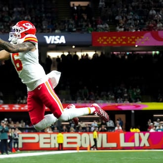 Kansas City Chiefs safety Bryan Cook (6) intercepts a pass during the first half of the NFL Super Bowl 59 football game against the Philadelphia Eagles, Sunday, Feb. 9, 2025, in New Orleans. (AP Photo/George Walker IV)
