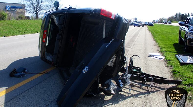 A couple wearing seat belts were not injured when their Dodge Ram towing a trailer was struck and overturned April 22, 2022, on Interstate 71 in Deerfield Twp. CONTRIBUTED