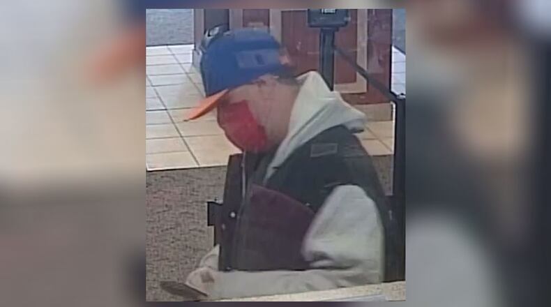 West Chester Twp. police are searching for an alleged bank robber who threatened force at the Fifth Third Bank on Cox Road last month and stole $6,350.