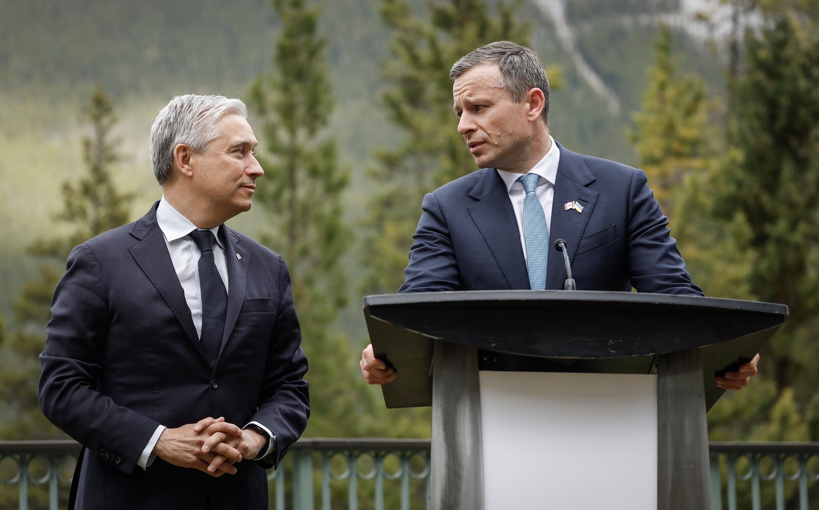 Ukraine Minister of Finance, Sergii Marchenko, right, and Canada's Finance Minister Francois-Philippe Champagne speak to the media prior to the G7 Finance Ministers meeting in Banff, Alberta, Tuesday, May 20, 2025. (Jeff McIntosh/The Canadian Press via AP)