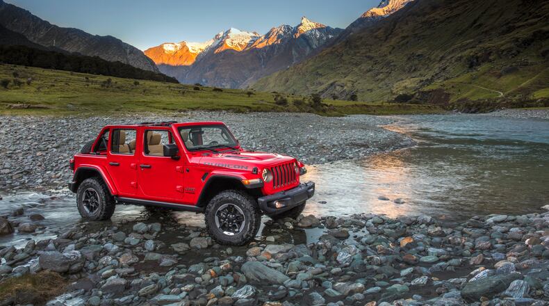 This photo provided by Stellantis North America shows the 2021 Jeep Wrangler Rubicon Unlimited. Available in two-door or four-door configurations and with a number of capable trim levels, the Jeep Wrangler is one of the most off-road focused vehicles you can buy today. (Courtesy of Stellantis North America via AP)