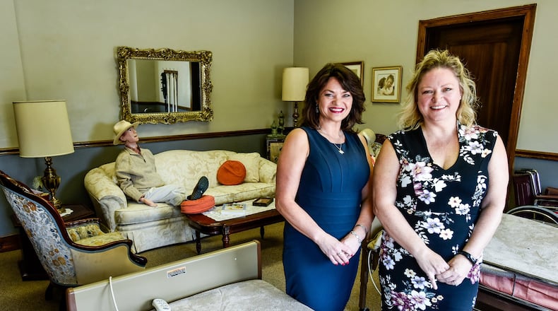Jennifer Douglas, left, and Sherry Marsh have started Awaken To Life Home Care in the former Hamilton Municipal building on High Street in Hamilton. The business will provide homecare needs to those in the area. They are standing in their training suite used to teach new employees. NICK GRAHAM/STAFF