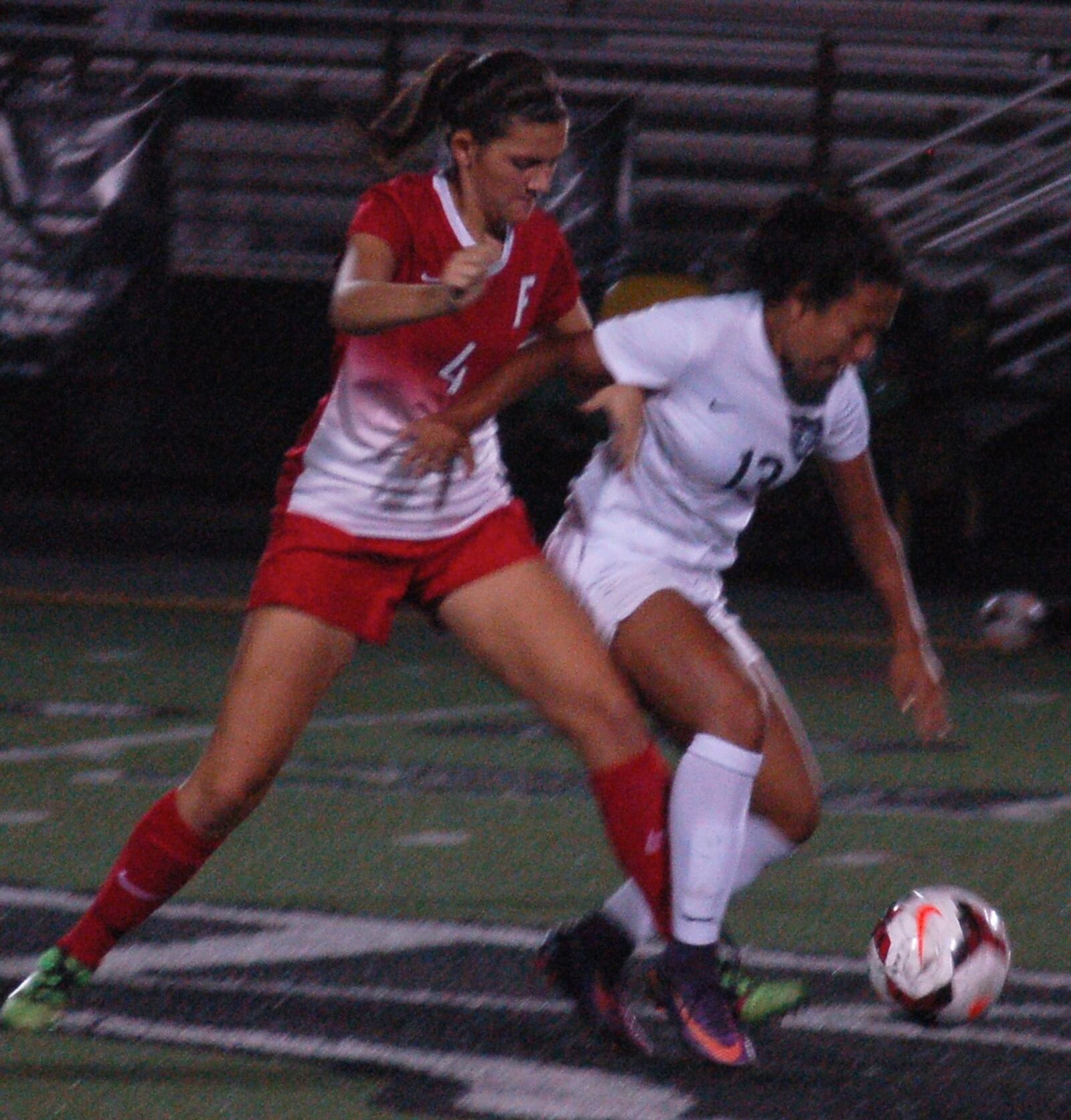 Lakota East’s Alexia Huon (right) and Fairfield’s Lauren Piatt battle for the ball Tuesday night in Liberty Township. CONTRIBUTED PHOTO BY JOHN CUMMINGS