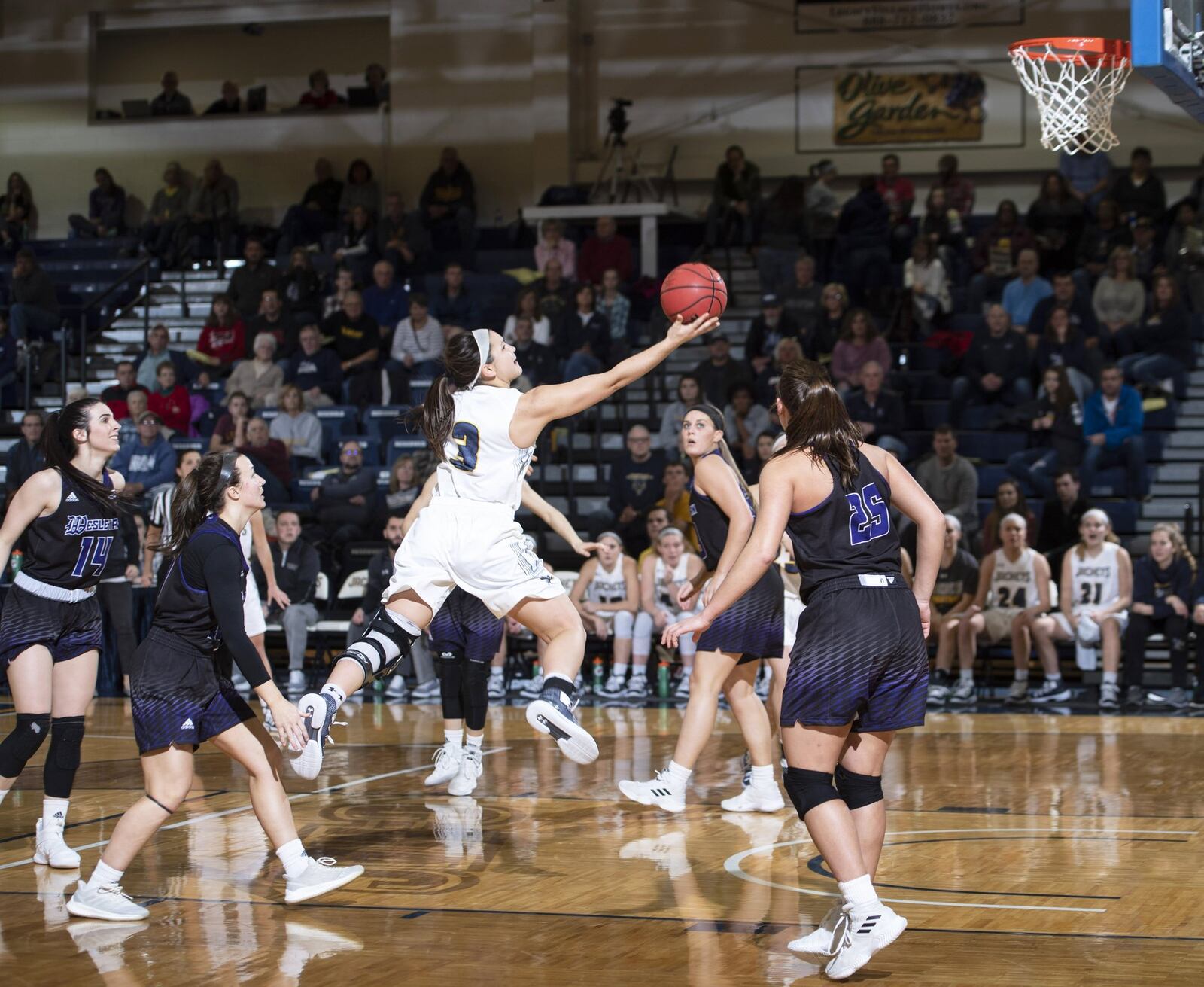 Cedarville University’s Abby Wolford cuts through the Kentucky Wesleyan defense on her way to the basket Dec. 8, 2018, in Cedarville. The host Yellow Jackets won 89-78. SCOTT HUCK/CEDARVILLE UNIVERSITY