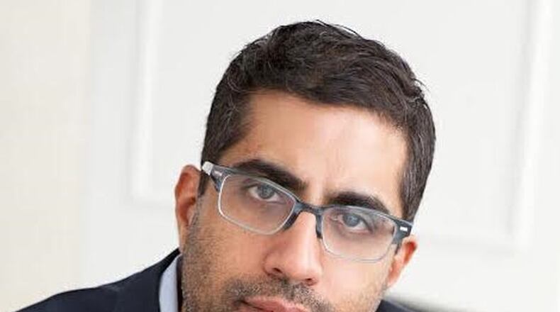 Talawanda High School graduate Sridhar Pappu has written a book about the 1968 baseball season and World Series in context of the time with race relations and the baseball players association. He will be in Oxford for a book signing at the Lane Library on Oct. 18. CONTRIBUTED