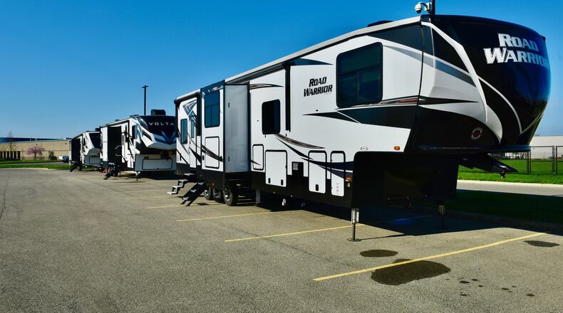 Three large campers in the Butler County Sheriff’s Office parking lot are part of preparation for a surge in the coronavirus pandemic to keep personnel safe and rested. They were donated last week by Jeff Couch’s RV Nation in Trenton. NICK GRAHAM/STAFF