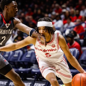 Lakota West's Andre Richardson dribbles the ball defended by Princeton's Jordan Johnson during their basketball game Friday, Feb. 6, 2026 at Xavier University's Cintas Center. Lakota West defeated Princeton 58-53. NICK GRAHAM/STAFF