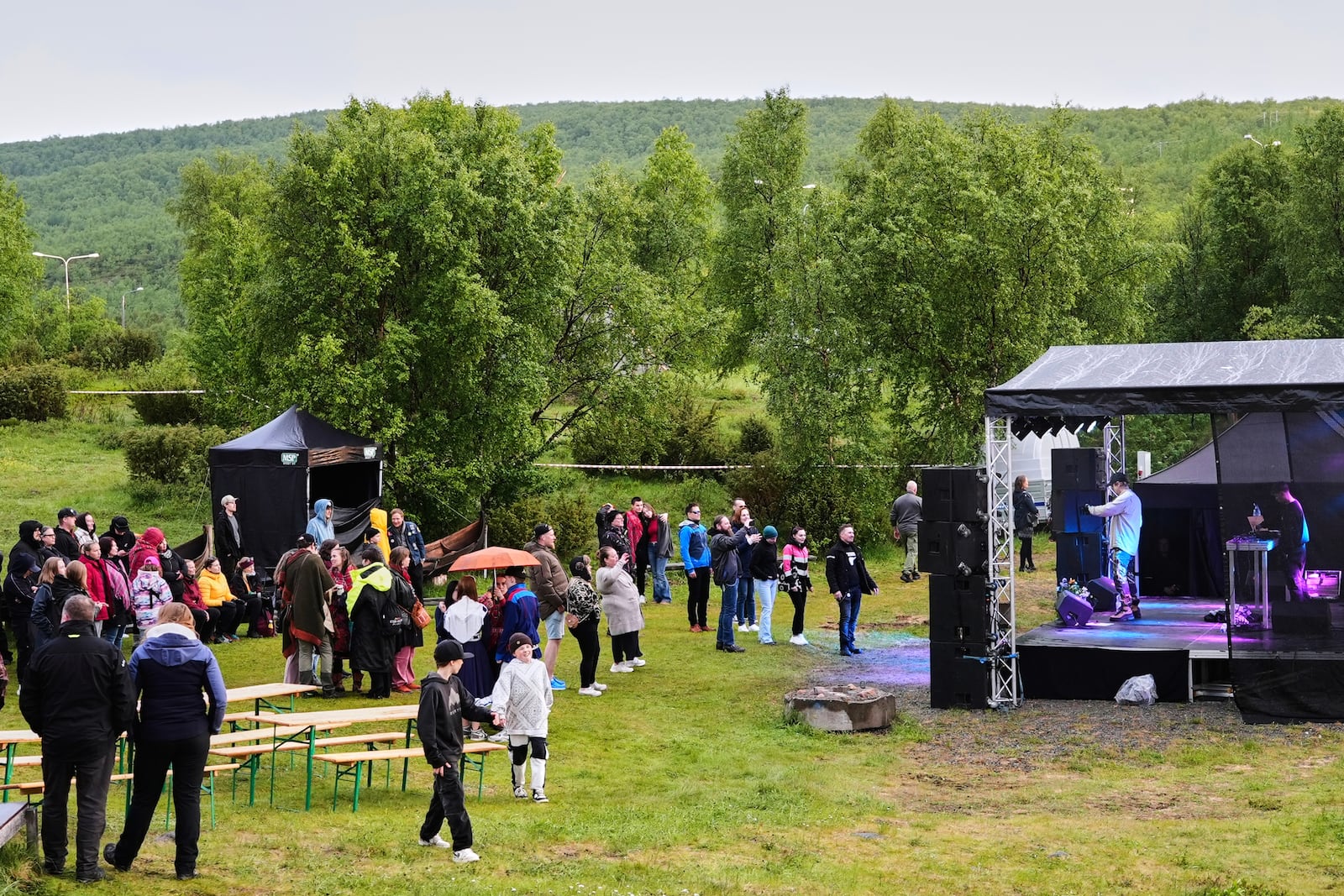 Artist Talonpoika Lalli performs at the Loktafeasta rap festival in Utsjoki village, north of the Arctic circle, Finland, Sunday, July 6, 2025. (AP Photo/Heli Sivunen)