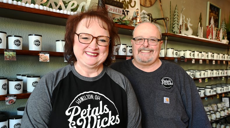 Sherry and Mike Hoskins, owners of Petals & Wicks, are retiring from the business after nearly a decade open on Main Street. They plan to sell the business, but if they can't find the right buyer, they'd close. Pending any sale of Petals & Wicks, their last day will be Dec. 28, 2025. MICHAEL D. PITMAN/STAFF