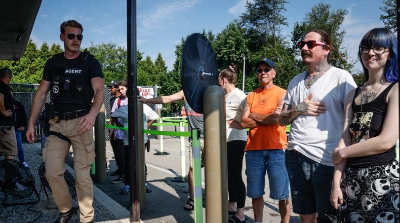 Marijuana fans line-up to enter Pure Ohio on Needmore Road in Harrison Twp. Tuesday the first day of recreation marijuana sales. Jim Noelker/Staff