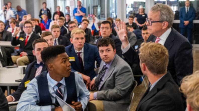 This week will see nearly 700 boys from around Ohio staying and learning at Miami University's main Oxford campus as part of the annual Buckeye Boys State conference. Coronavirus last year shut down summer youth conferences at Miami. Pictured is Gov. Mike DeWine in 2019 as he speaks with teen delegates for the conference.  Contributed