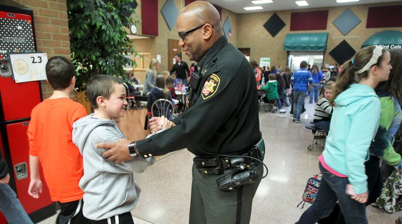 Lakota Schools will add eight more armed school resource officers during the coming school year. It’s the latest of many security enhancements being installed by Butler County’s largest school system. GREG LYNCH/2014