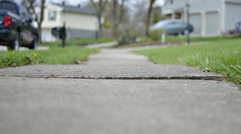 About a quarter of the city will have sidewalks repaired in 2019. MICHAEL D. PITMAN/FILE
