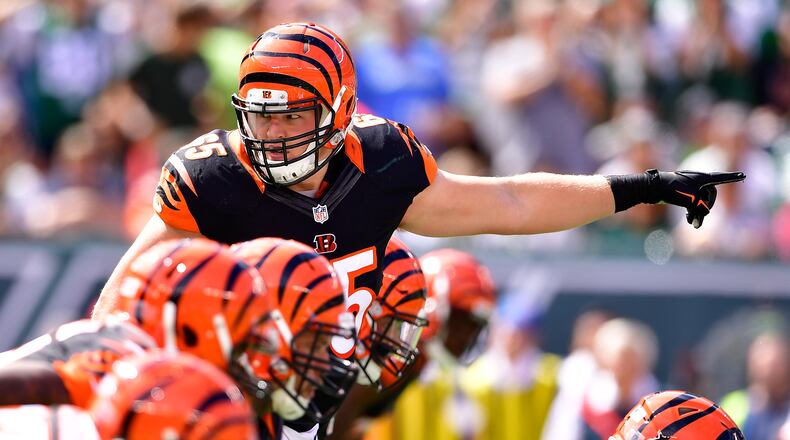 EAST RUTHERFORD, NJ - SEPTEMBER 11: Clint Boling #65 of the Cincinnati Bengals directs his teammates against the New York Jets during the second quarter at MetLife Stadium on September 11, 2016 in East Rutherford, New Jersey. The Cincinnati Bengals defeated the New York Jets 23-22. (Photo by Steven Ryan/Getty Images)