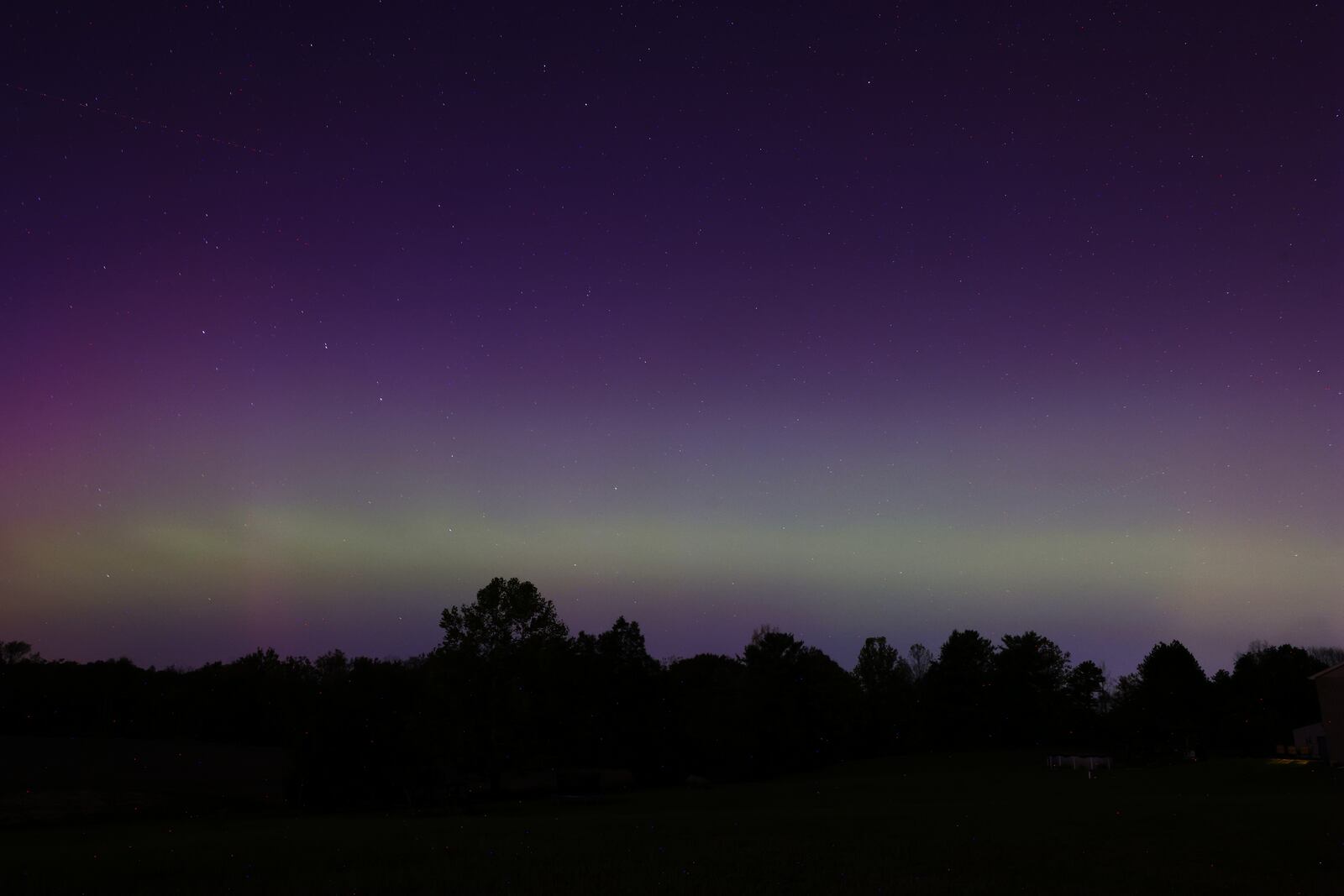 The Aurora Borealis, or northern lights, was visible from Ohio Thursday, Oct. 10, 2024. This was in Madison Township in Butler County. NICK GRAHAM/STAFF