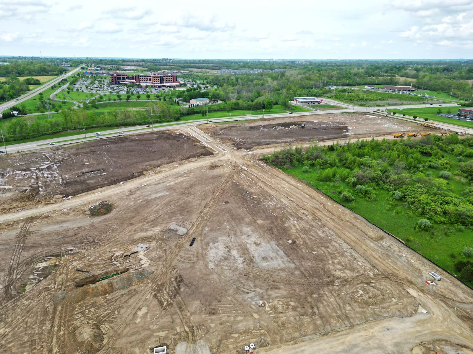 Infrastructure work is near completion for a proposed 160,000-square-foot multipurpose event center along Interstate 75 on the east side of Middletown at Ohio 122 and Union Road, shown by aerial view Friday, May 2, 2025. NICK GRAHAM/STAFF