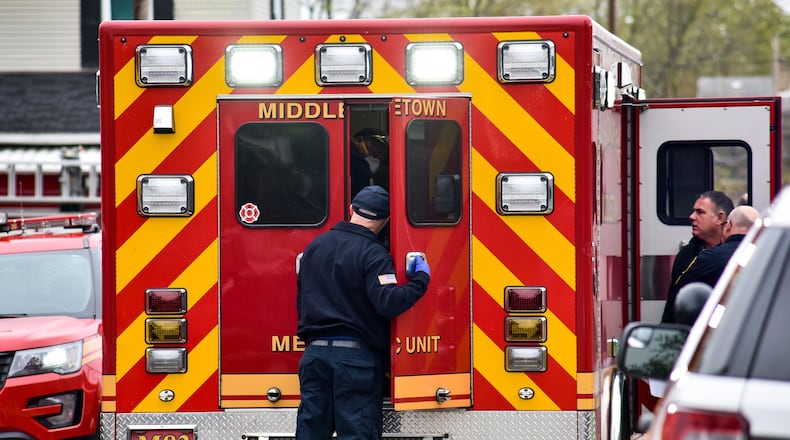 Middletown police and fire departments respond to the report of a shooting Monday morning, April 13, 2020 near the intersection of Calumet Avenue and Young Street in Middletown. NICK GRAHAM / STAFF