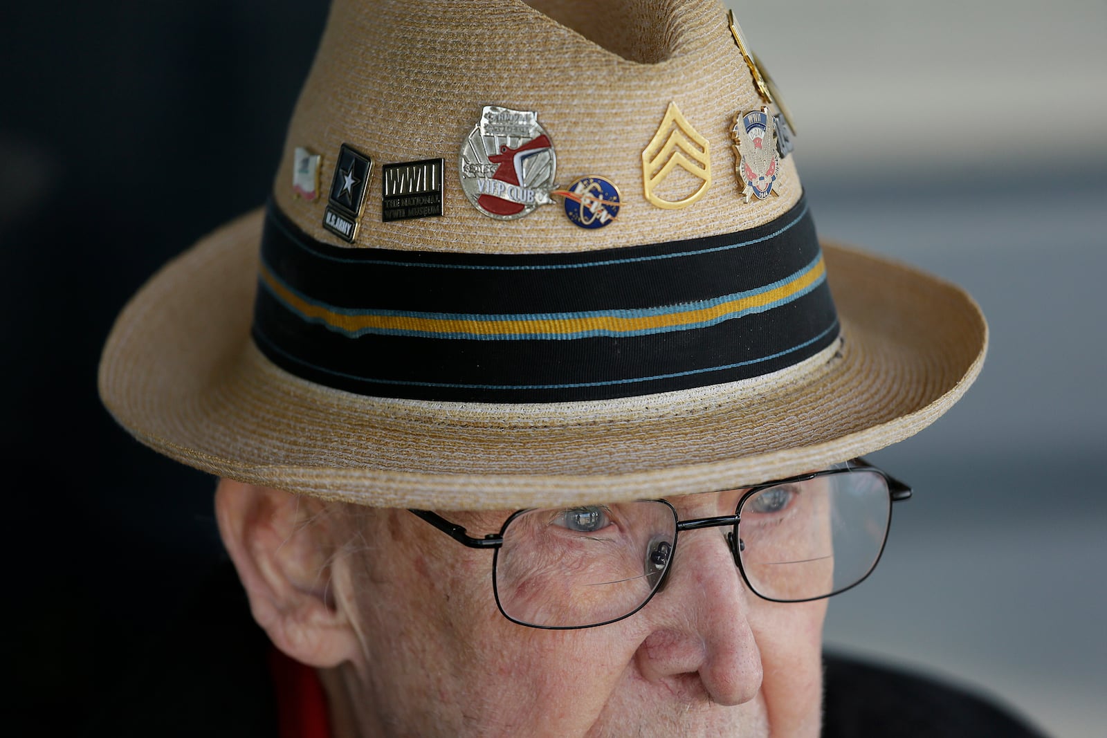 FILE - In this photo taken April 29, 2019, D-Day veteran Jake Larson watches as the "The Spirit of Benovia" WWII-era aircraft lands in Oakland, Calif. (AP Photo/Eric Risberg, file)