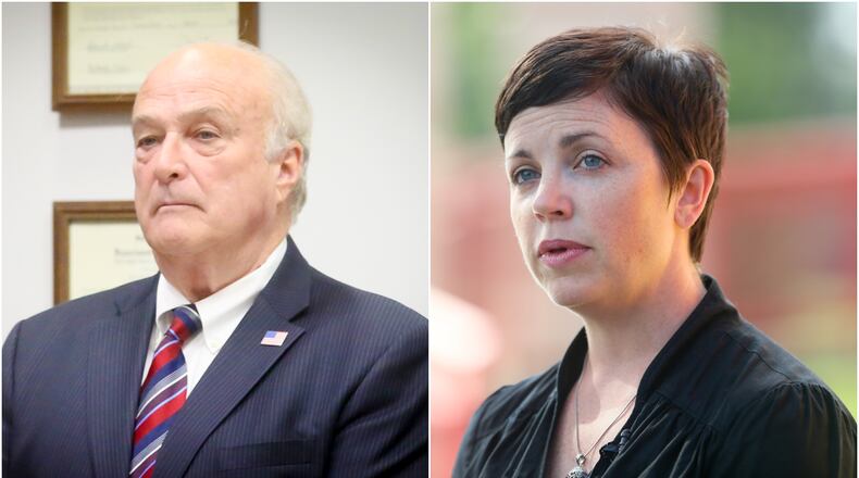 Butler County Prosecutor Michael Gmoser (left) and Butler County Democratic Party Executive Chairwoman Jocelyn Bucaro.