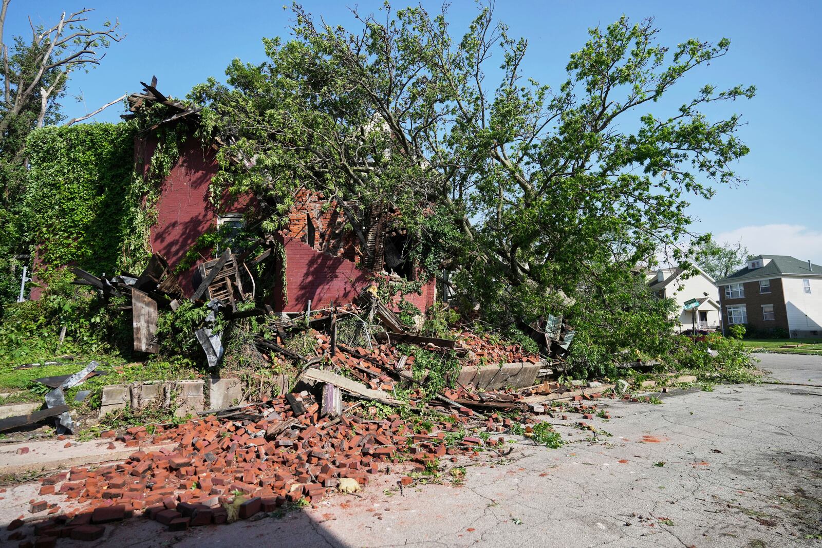 Debris is seen after a severe storm moved through Friday, May 16, 2025, in St. Louis. (AP Photo/Jeff Roberson)
