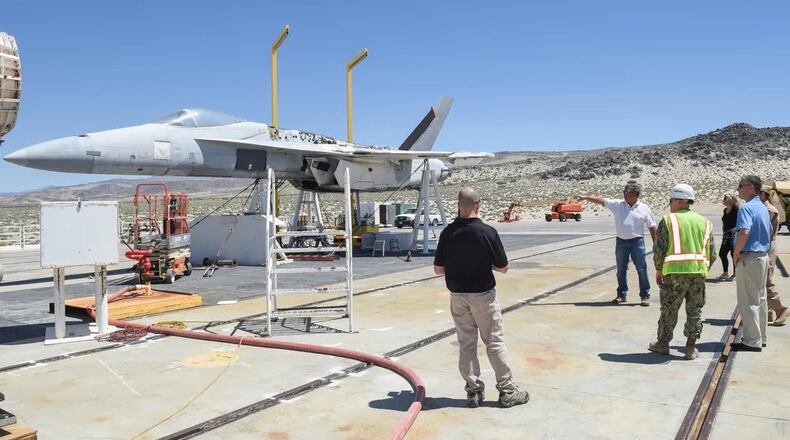 U.S. Sailors and civilians view a test site on Naval Air Weapons Station China Lake in 2019. (U.S. Navy photo by Mass Communication Specialist 3rd Class Jeffery L. Southerland)