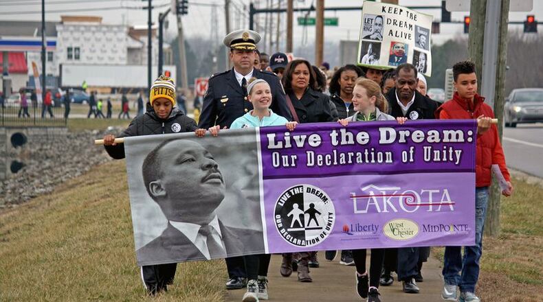 FILE PHOTO: While some live Martin Luther King Jr. commemorative events scheduled for our area Monday have been canceled, others have been altered and or are moving to online, virtual events. Among those are West Chester Twp.'s annual MLK March (pictured), which in past years has drawn some of the largest number of participants. (File Photo\Journal-News)