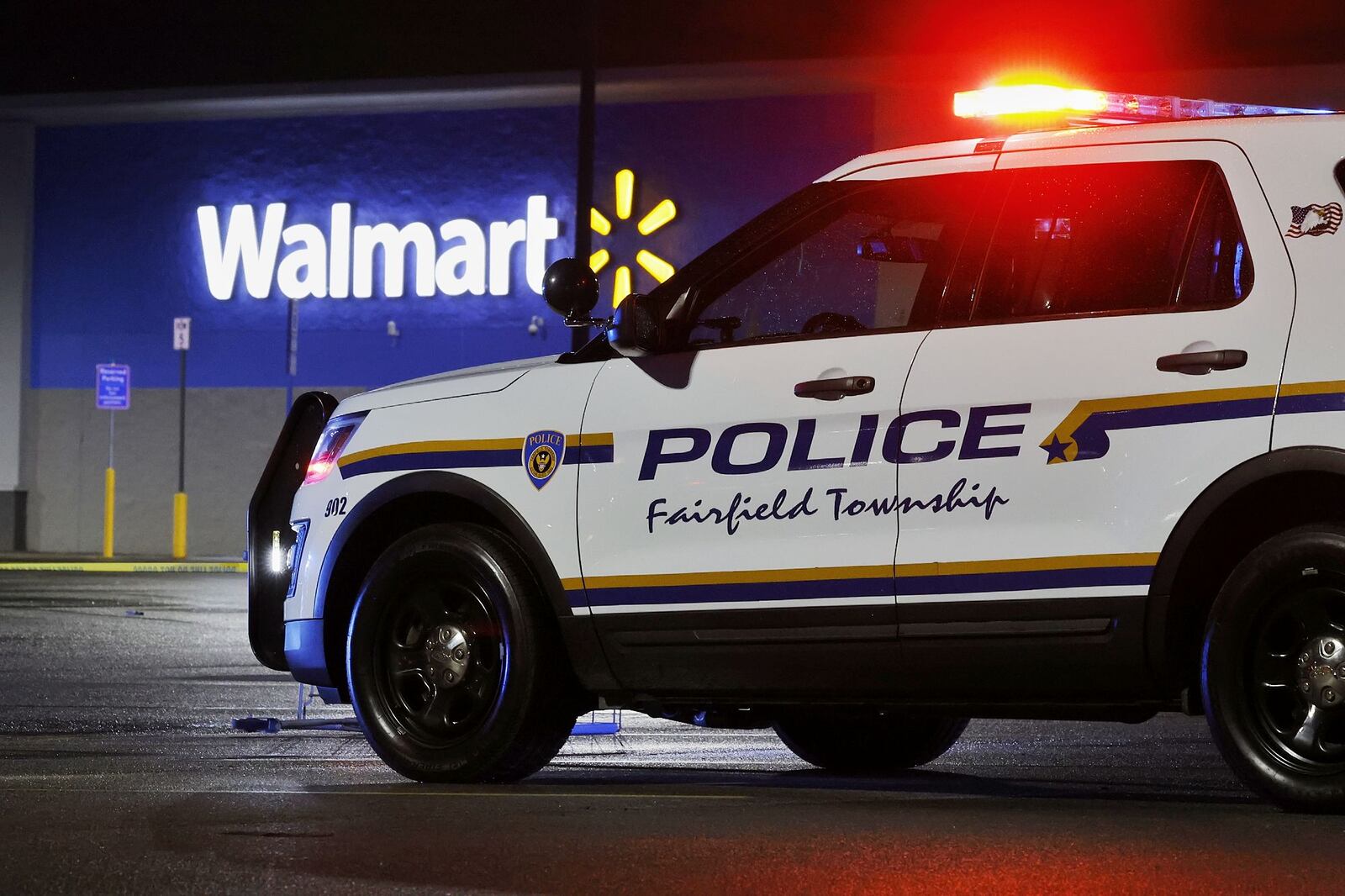 Police investigate a fatal shooting at Walmart on Princeton Road in Fairfield Township Thursday, May 26, 2022. NICK GRAHAM/STAFF