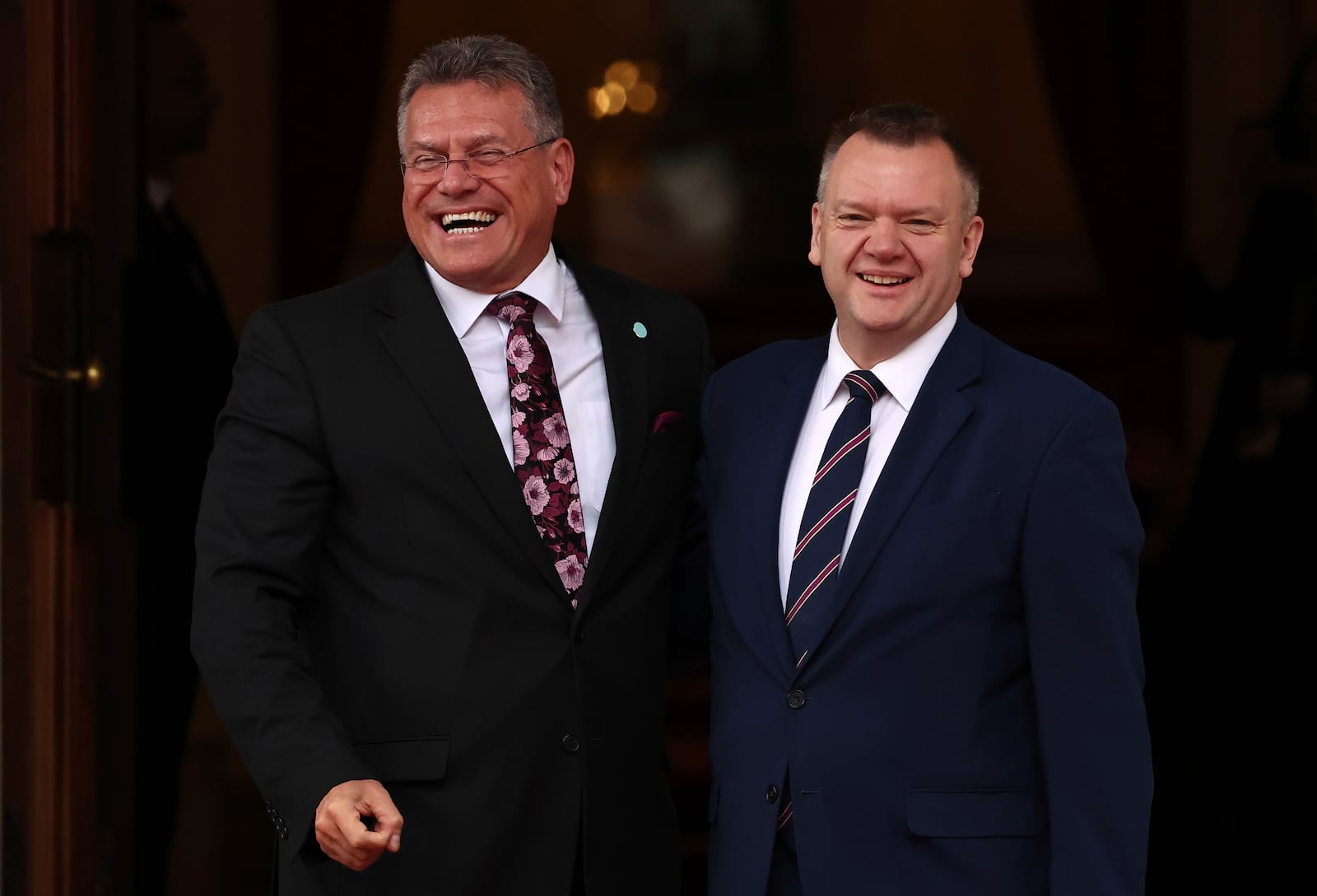 Britain's Paymaster General and Minister for the Cabinet Office for the Constitution and European Relations Nick Thomas-Symonds greets EU Commissioner for Trade and Economic Security, Maros Sefcovic, right, as he arrives to attend the UK-EU Summit at Lancaster House, in London, Monday, May 19, 2025. (Henry Nicholls/Pool Photo via AP)