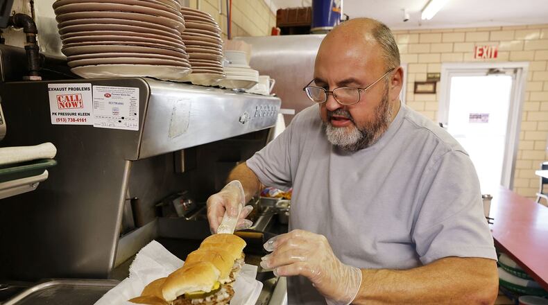 Roy Fondren has reopened Red's Hamburgers in St. Clair Township with many favorites and some new food items. NICK GRAHAM/STAFF