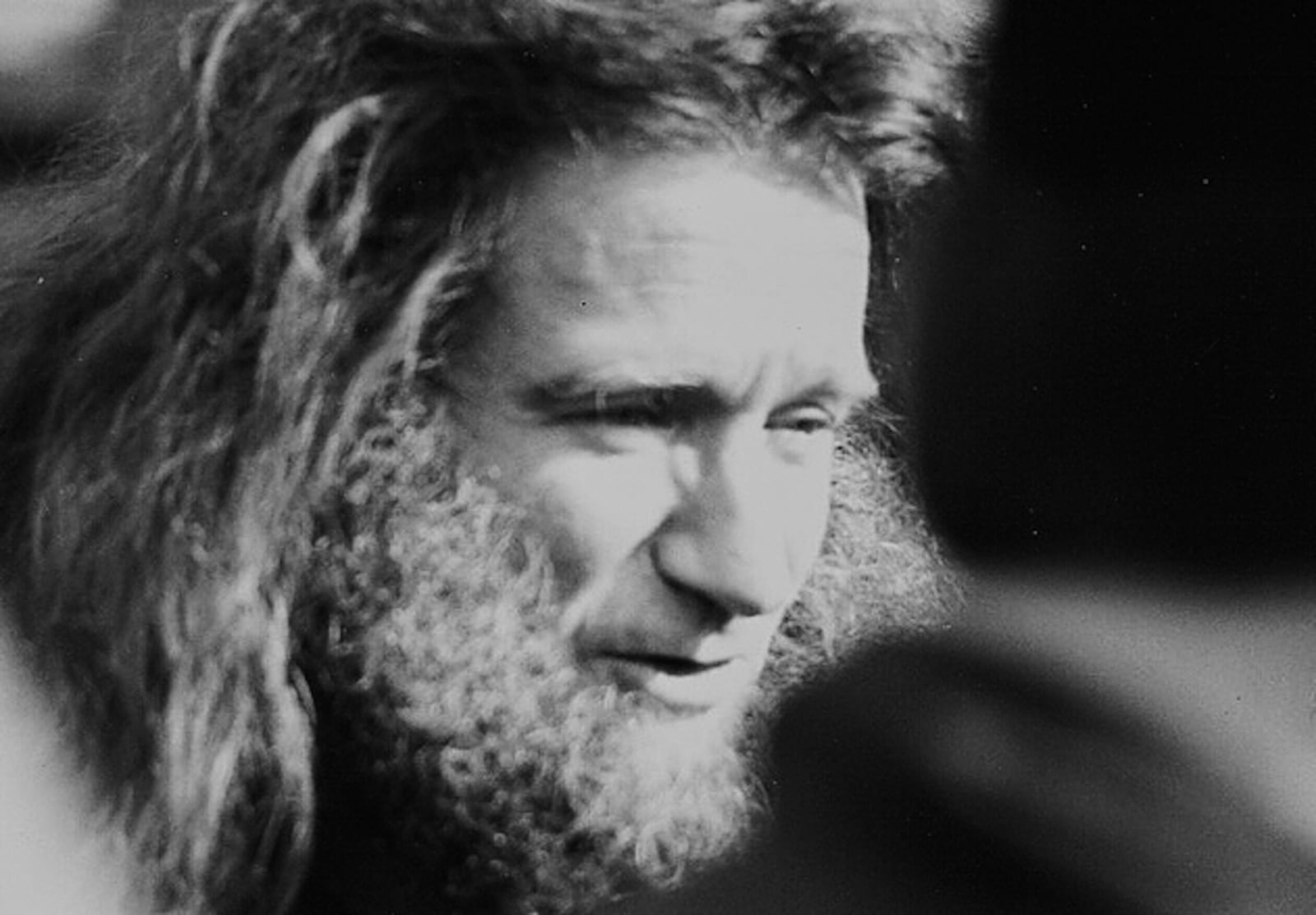 Actor Robin Williams takes a break from a make-up session to speak with locals watching the filming of Jumanji on Nov. 15, 1994 in Keene, N.H. (Maureen E. McHugh via AP File)