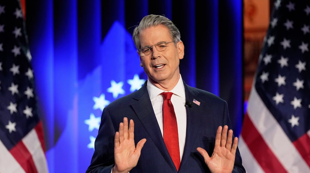 Scott Bessent, US Secretary of the Treasury, holds a speech at the USA House during the Annual Meeting of the World Economic Forum in Davos, Switzerland, Tuesday, Jan. 20, 2026. (AP Photo/Markus Schreiber)