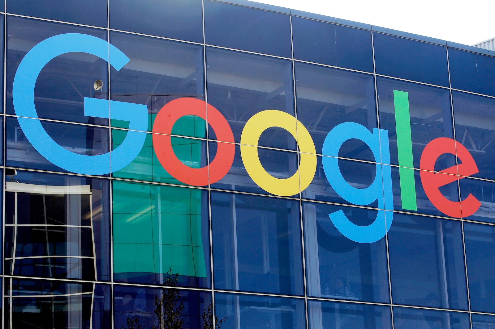 FILE - A sign is displayed on a Google building at their campus in Mountain View, Calif., on Sept. 24, 2019. (AP Photo/Jeff Chiu, File)