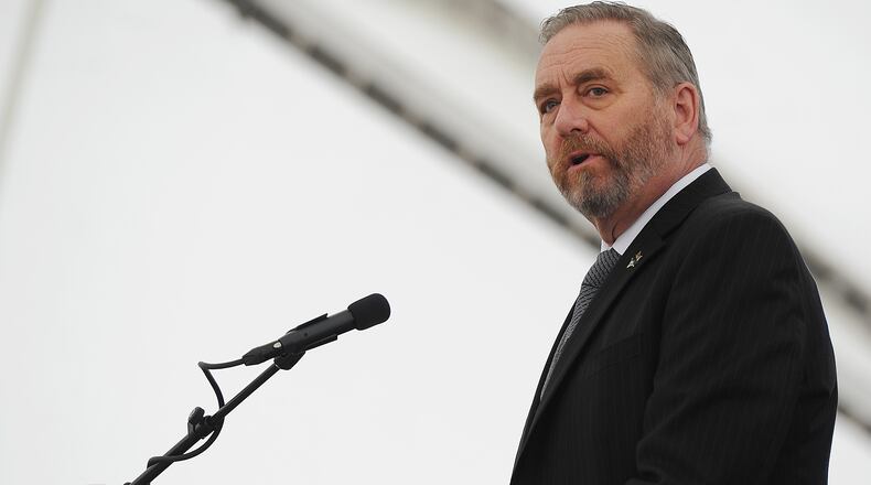 File - Ohio Attorney General Dave Yost at the Montgomery County 15th Annual Law Enforcement Memorial Ceremony held at Riverscape Friday, May 6, 2022. MARSHALL GORBY\STAFF