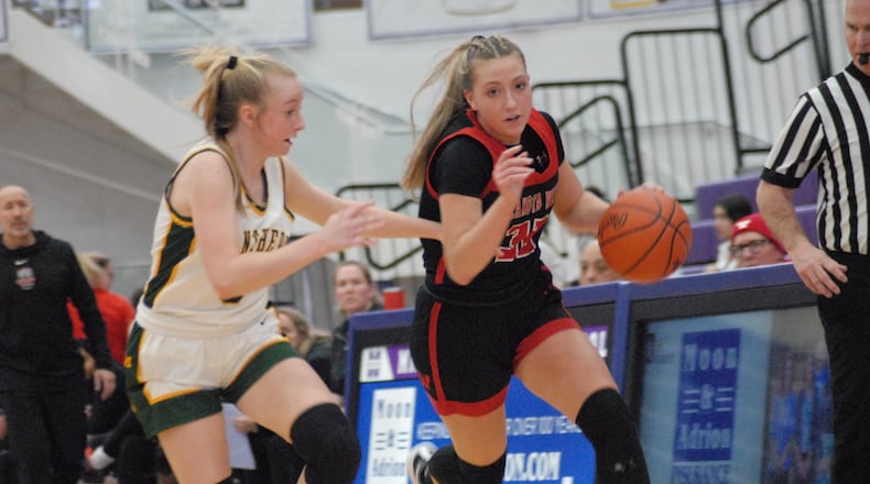 Lakota West's Katie Fox drives past Little Miami's Emily Bayles during a game last season. Chris Vogt/CONTRIBUTED
