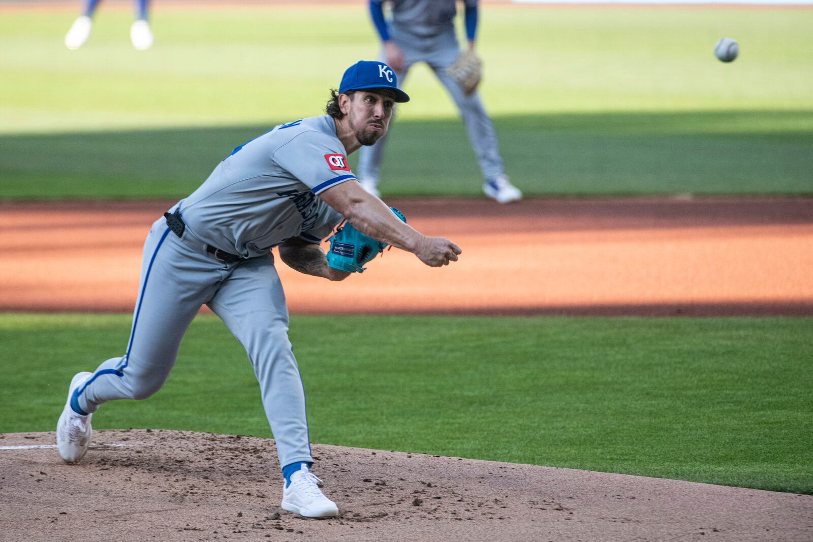 Kansas City Royals staring pitcher Michael Lorenzen delivers against the Cleveland Guardians during the first inning of a baseball game in Cleveland, Saturday, April 12, 2025. (AP Photo/Phil Long)