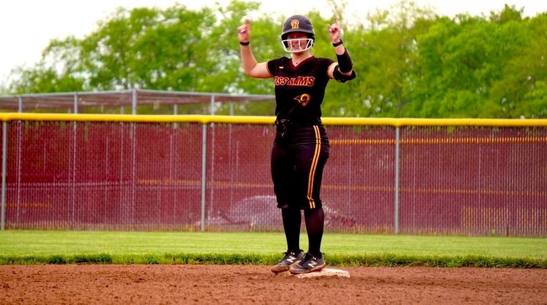 Ross senior Myrissa Combs celebrates at second base after tying the school record with 40 career doubles against Franklin on Friday. Chris Vogt/CONTRIBUTED