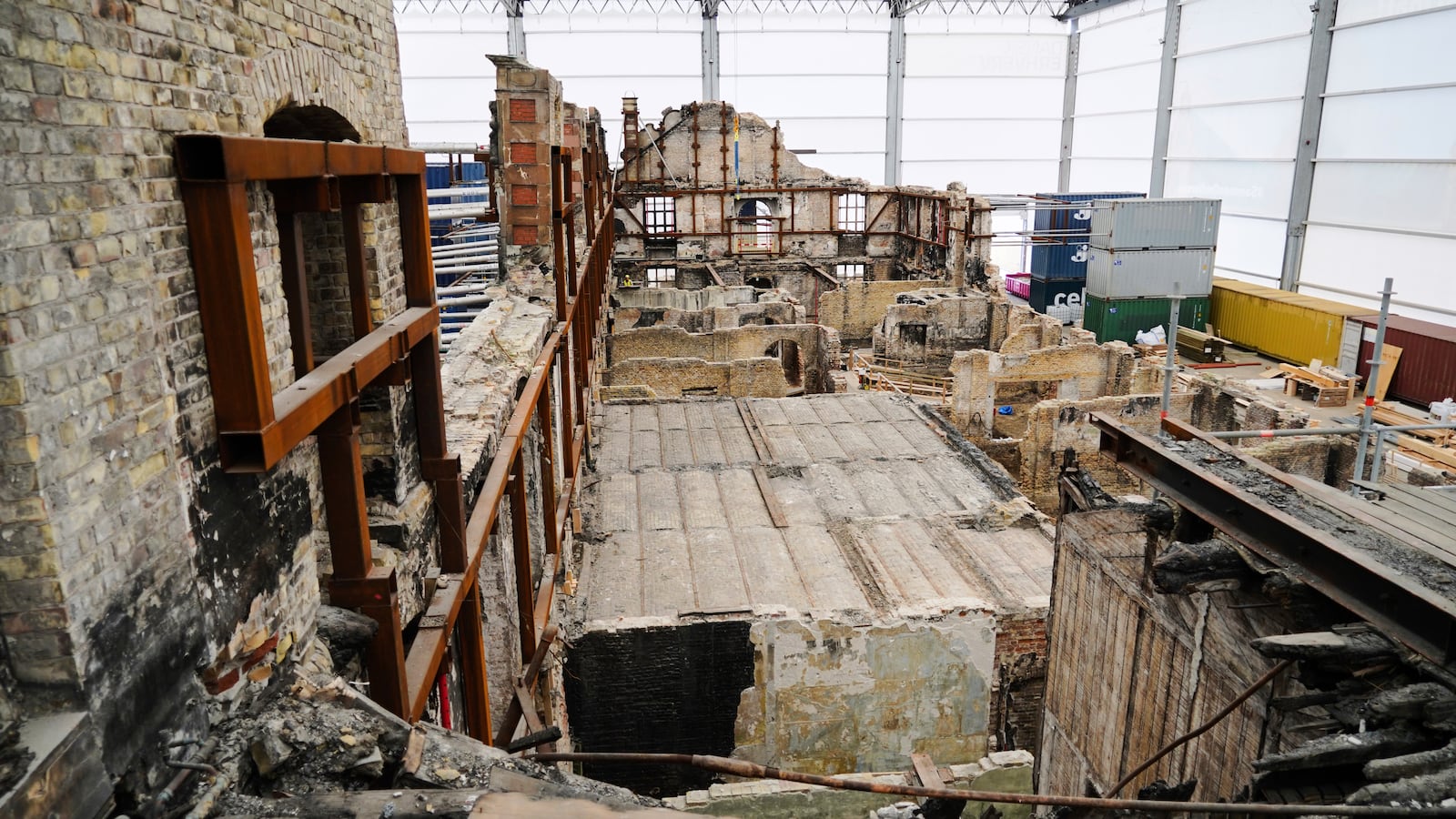 A general view on the remains of the fire-damaged Old Stock Exchange building in Copenhagen, Denmark, Monday, June 23, 2025. (AP Photo/James Brooks)