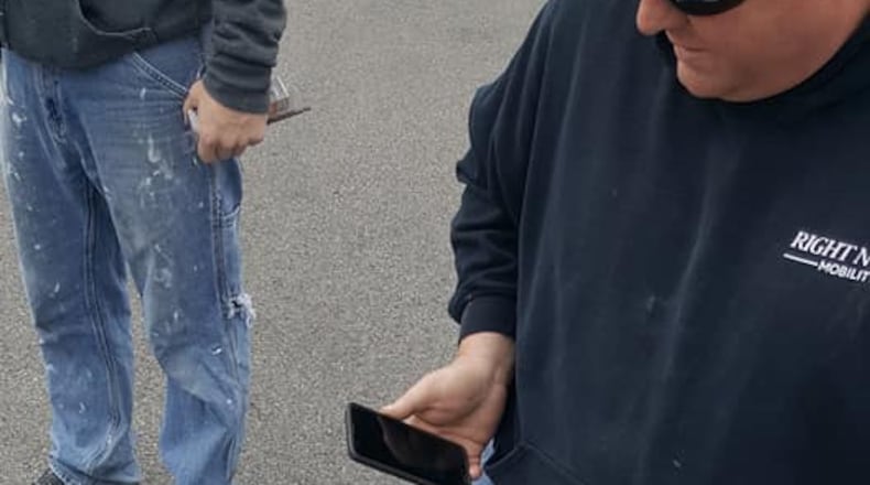 The owner of a work van holds down Paul Fugate after he allegedly was caught trying to steal $2,000 worth of tools out of the man’s van that was parked at Lowe’s. Fugate was charged with theft.