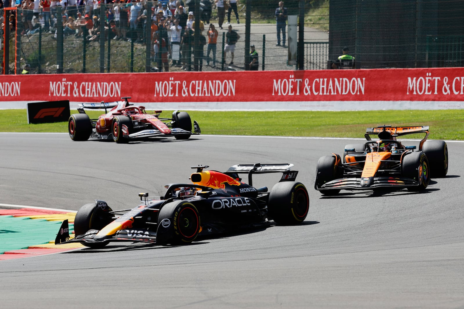 Red Bull driver Max Verstappen of the Netherlands, left, steers his car during the sprint race ahead of the Formula One Grand Prix at the Spa-Francorchamps racetrack in Spa, Belgium, Saturday, July 26, 2025. (AP Photo/Geert Vanden Wijngaert)