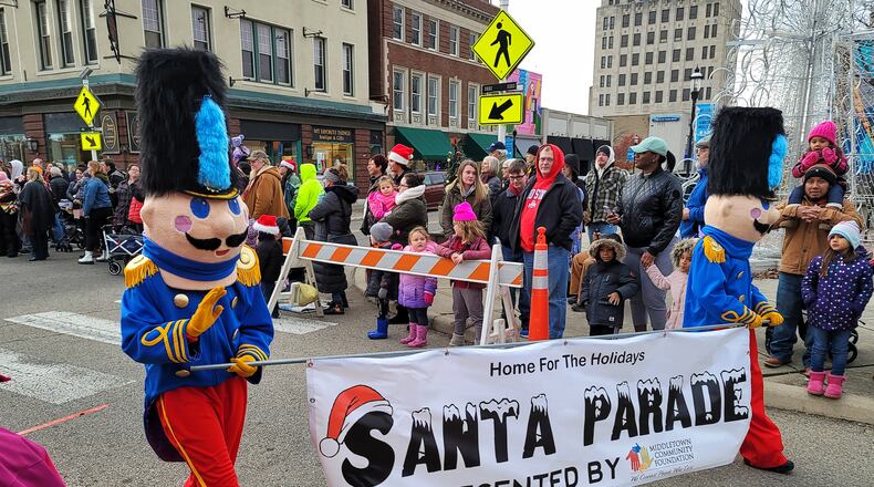 Middletown's 15th Santa Parade kicks off at 4 p.m. Saturday, Nov. 26, 2022 from MidPointe Library and concludes at Manchester Avenue. Middletown native Kyle Schwarber will serve as grand marshal of the Santa Parade after helping the Philadelphia Phillies to their first postseason since 2011. Besides Schwarber, the parade will feature Santa and Mrs. Claus riding in a Middletown fire truck, numerous floats, characters in costumes, musical groups and dance teams. When the parade ends, the official city of Middletown Christmas tree will be lit. NICK GRAHAM/FILE PHOTO