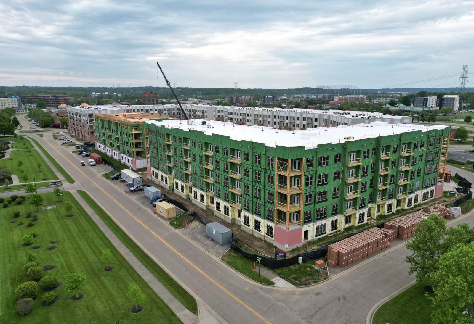 The $50 million Clocktower condo/apt. complex project at the high-profile center square of West Chester Twp. enters its final phase of construction and West Chester Township officials recently announced new plans to expand and add features to The Square @ Union Center to attract and cater to hundreds of new residents expected to move in by early 2025. These could include a splash park, public art and an outdoor performance stage. NICK GRAHAM/STAFF