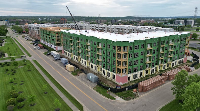 The $50 million Clocktower condo/apt. complex project at the high-profile center square of West Chester Twp. enters its final phase of construction and West Chester Township officials recently announced new plans to expand and add features to The Square @ Union Center to attract and cater to hundreds of new residents expected to move in by early 2025. These could include a splash park, public art and an outdoor performance stage. NICK GRAHAM/STAFF