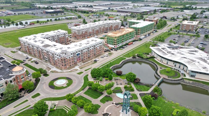 The $50 million Clocktower condo/apt. complex project at the high-profile center square of West Chester Twp. enters its final phase of construction and West Chester Township officials recently announced new plans to expand and add features to The Square @ Union Center to attract and cater to hundreds of new residents expected to move in by early 2025. These could include a splash park, public art and an outdoor performance stage. NICK GRAHAM/STAFF