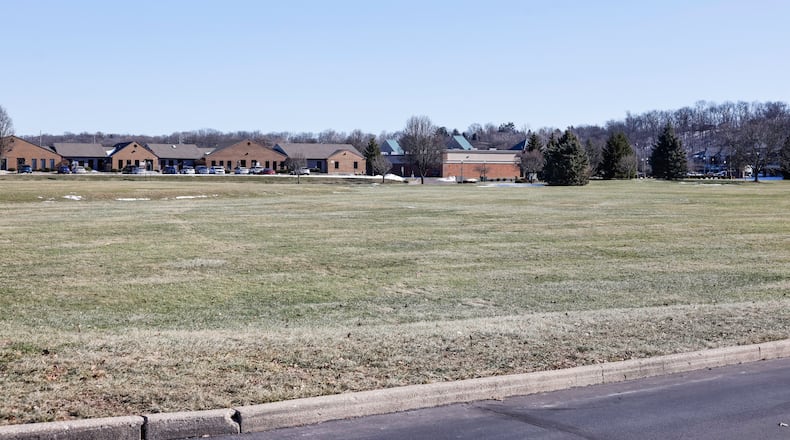 This is land near the Fairfield Fire Department headquarters on Nilles Road that Hamilton will deed to Fairfield in exchange for land on Groh Lane near the Joe Nuxhall Miracle League Fields. Fairfield will pay to drill a new raw water well on the Groh Lane site . NICK GRAHAM/STAFF