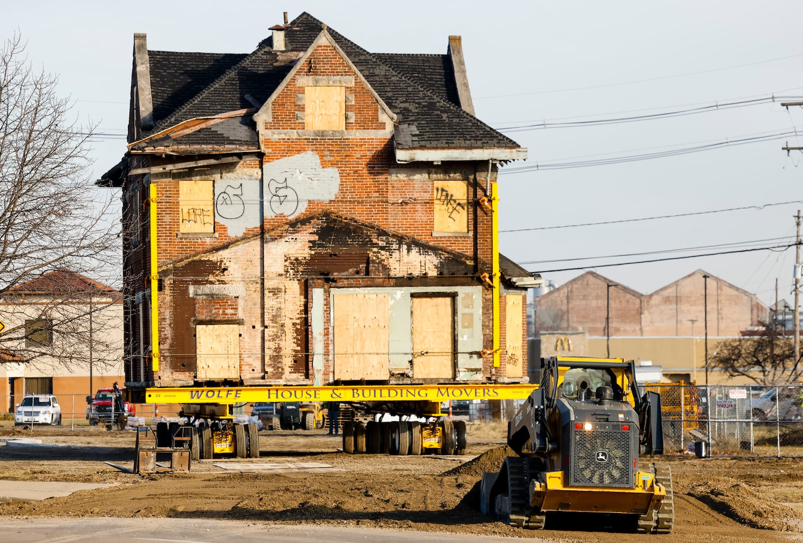 Crews with Wolfe House & Building Movers moved the former CSX train depot 1,000-plus feet north on Martin Luther King Jr. Boulevard to its new location at the corner of Maple Avenue and MLK Boulevard Tuesday, Dec. 20, 2022. NICK GRAHAM/STAFF