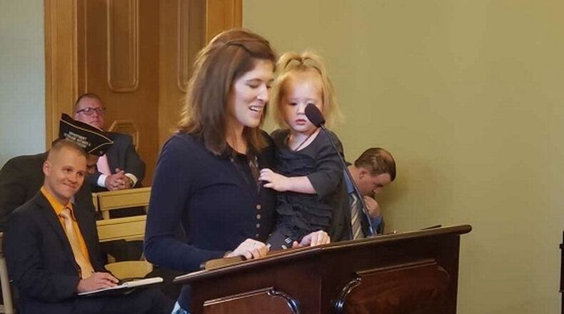 Brianna McKinnon of Dayton testified before members of the Ohio House about a bill she worked on with then-Rep. Rick Perales, R-Beavercreek, in this 2019 photo. The bill granted temporary professional licenses to members of the military and their spouses.