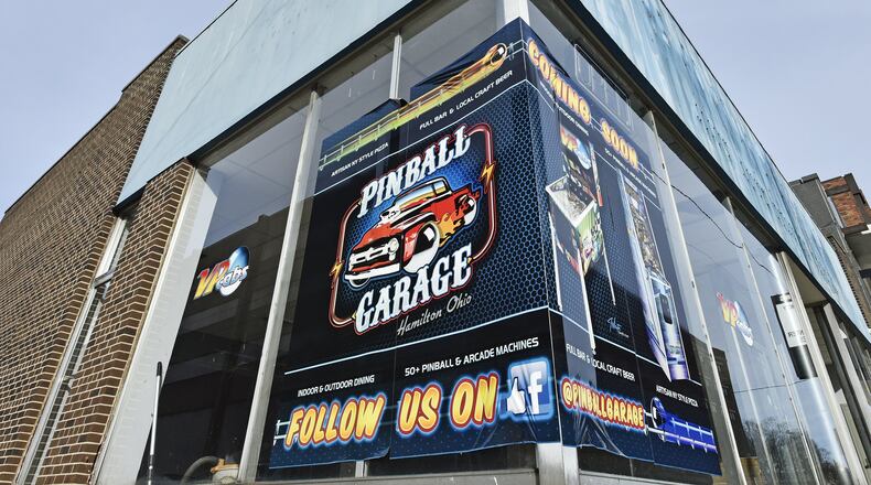 Interior demolition work is being conducted at Pinball Garage, which is working to open sometime this spring in downtown Hamilton. Owner Brad Baker said he plans to feature between 30 and 50 mechanical pinball machines alongside the creations of his own company, VPcabs Virtual Pinball. NICK GRAHAM / STAFF