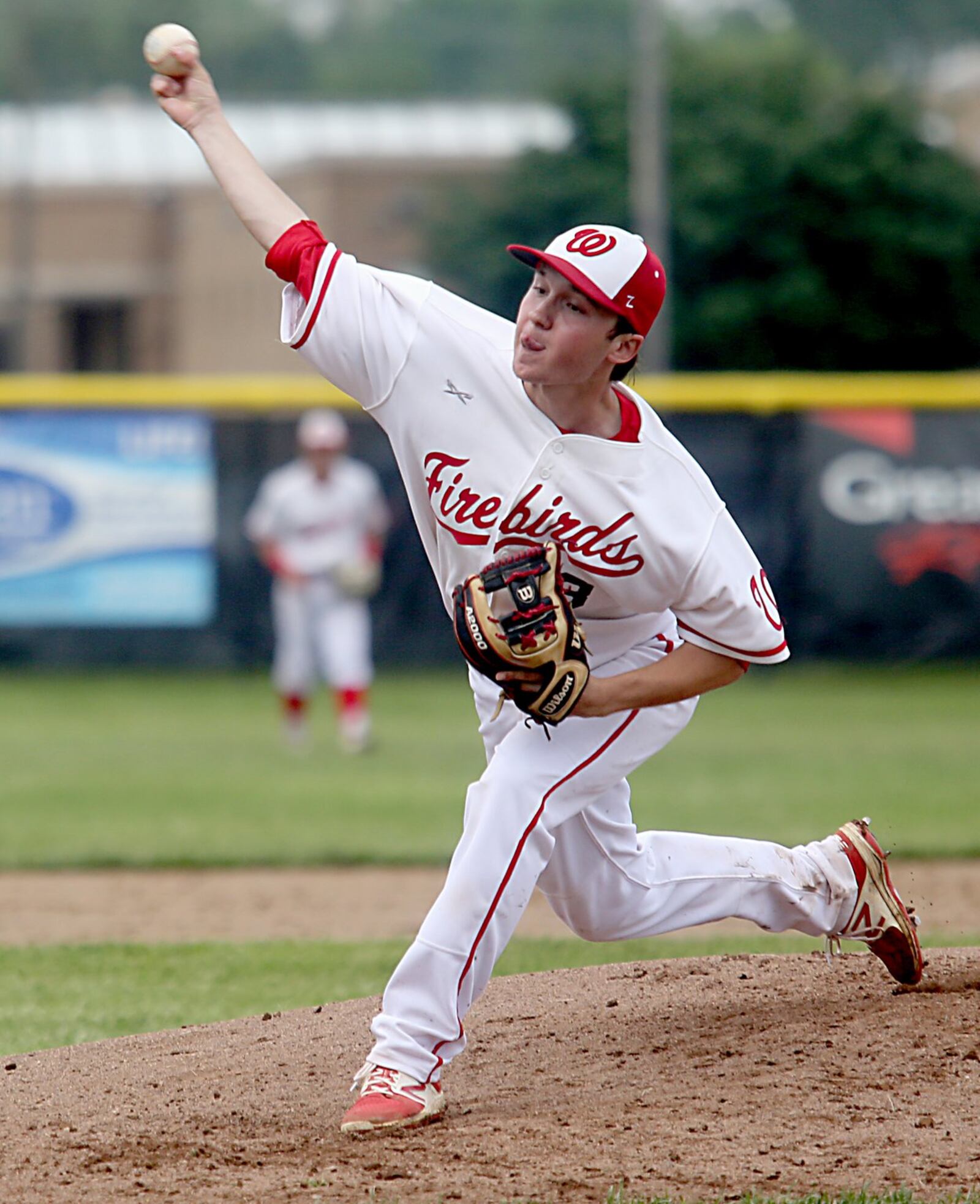 Lakota West pitcher Max Kiker sends the ball toward the plate Saturday during a Division I district final against Springboro at Centerville. CONTRIBUTED PHOTO BY E.L. HUBBARD